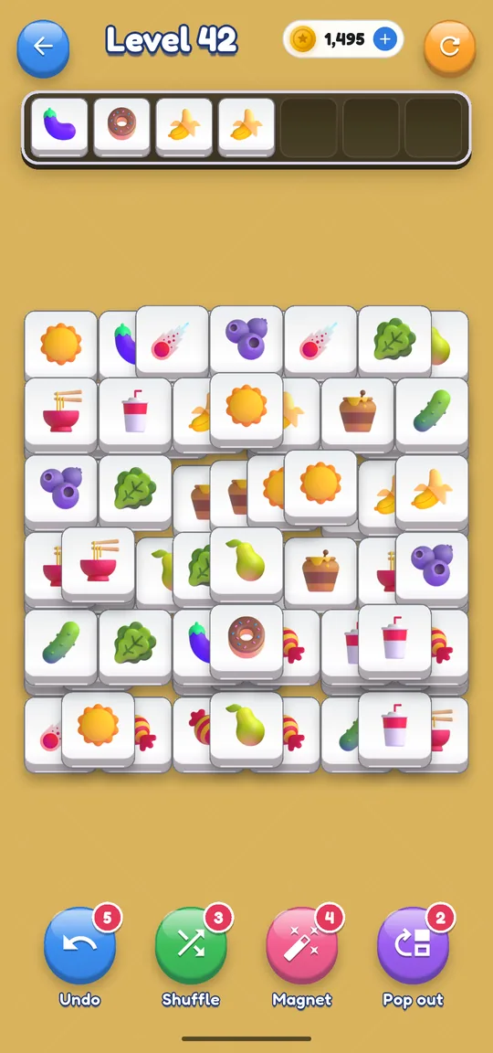 A Glazed board of glossy emoji tiles with the tray at the top